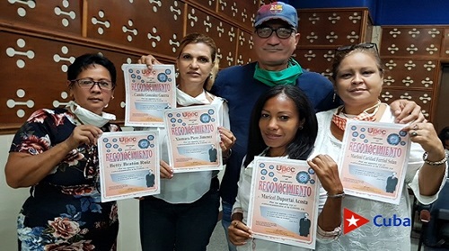 Periodistas reconocidos por la UPEC en atención a sus coberturas en medio de la covid-19. Texto y foto: Santiago Romero Chang.